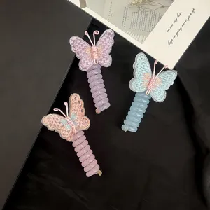 Close-up detail shot of cute embroidered butterfly telephone wire hair ties with vibrant colors.