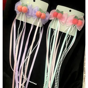 Bellissimi fermagli per capelli con fiocco di pesca e nappe di perle accessori fatti a mano.