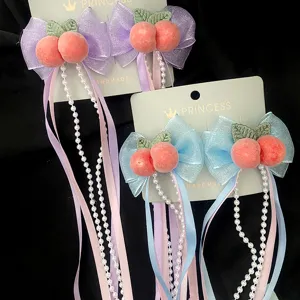 Fermagli per capelli con fiocco di pesca e nappe di perle per uno stile dolce e carino.