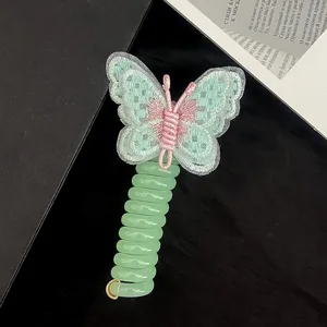 Details of cute embroidered butterfly hair tie, green phone wire hair band for kids ponytail.