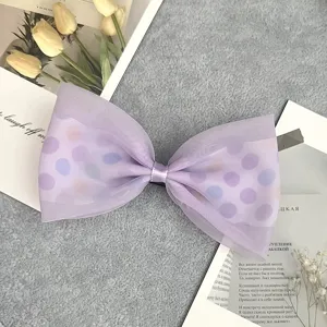 Girls lavender polka dot mesh hair bow clip, cute sheer fabric hair accessory for kids.