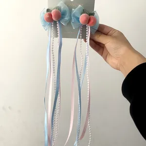 Fermagli per capelli con fiocco blu dolce con ciondoli di pesca e lunghe nappe di perle