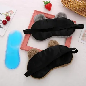 Cute plush bear sleep mask with elastic strap and cooling gel ice pack for comfortable rest.