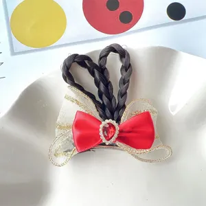 Cute kids bow hair clip with braided hair and red crystal rhinestone for princess style dress up.