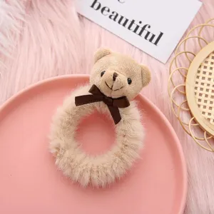 Cute plush bear hair scrunchie with sweet bow detail, soft fuzzy hair ring for women.