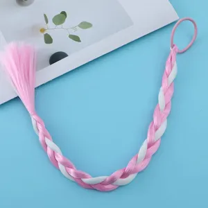 Close-up detail of children colorful synthetic hair braid with pink white color block design.