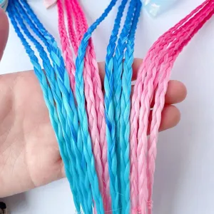 Close-up detail of colorful braided synthetic hair extensions for kids with gradient blue pink.