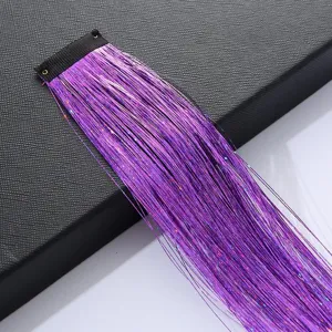 Sparkly purple hair tinsel clip-in extension strand for creative braided hairstyle detail