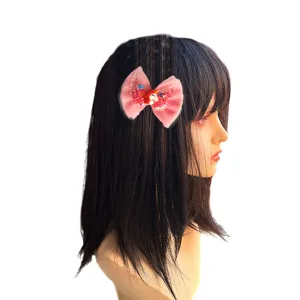 Pink mesh bow unicorn hair clip detail view, cute side hair accessory for little girls.
