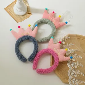 Fluffy fleece crown headband for women, sweet plush hair hoop with colorful pom poms.