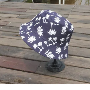 Classic navy blue bucket hat featuring a white tropical palm tree print, stylish and casual.
