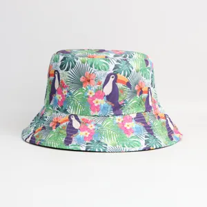 Tropical toucan print bucket hat for summer outdoor sun protection and foldable fisherman use.
