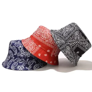 Detailed view of trendy paisley bucket hat featuring blue, red and black printed designs.