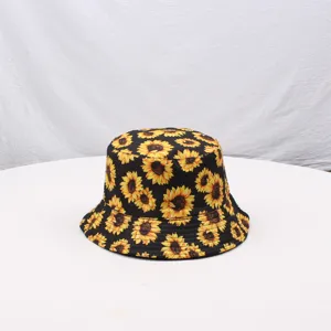 Sunflower print bucket hat for women, stylish black sun protection casual fisherman hat.