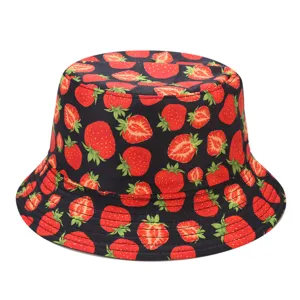 Stylish black bucket hat featuring a vibrant red strawberry all-over print for summer sun.