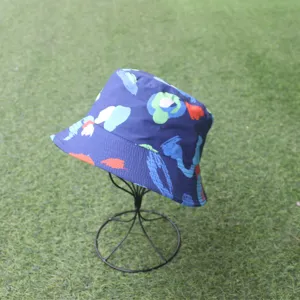 Detailed view of the blue abstract printed bucket hat, featuring a stylish sun protection design.