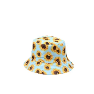 Light blue sunflower print bucket hat for women, fashionable floral sun protection cap.
