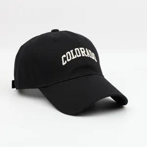 Detailed close-up of black cotton baseball cap featuring white Colorado embroidery.