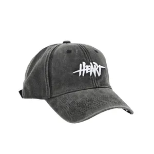 Washed distressed vintage baseball cap in dark grey with unique HEART front embroidery detail.