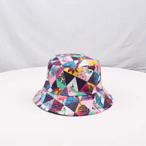 Detailed view of the colorful tropical print bucket hat, perfect for sun protection outdoors.