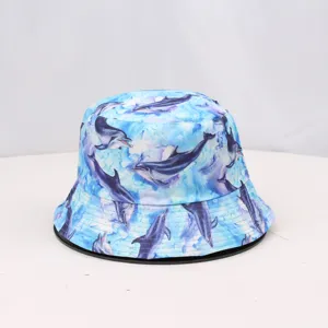 Blue dolphin print bucket hat detail, summer sun protection casual hat close up view