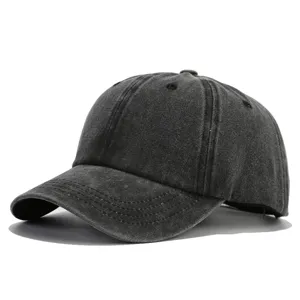 Distressed washed denim baseball cap detail, vintage dark grey curved visor sun hat for outdoor use.