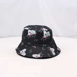 Close-up detail of the black koala print bucket hat, showing the cute animal pattern texture.