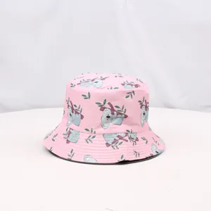 Pink koala print bucket hat detail featuring cute animal fabric and wide brim sun protection.