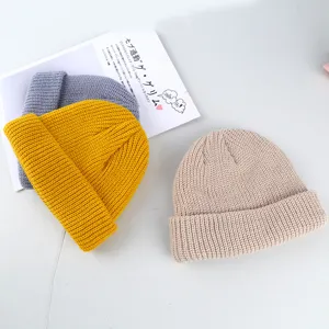 Solid color knit beanie hat winter warm roll edge cap unisex casual streetwear style main view