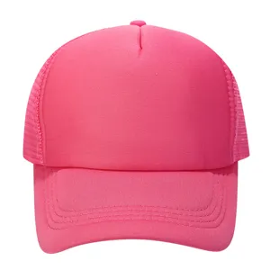 Detailed view of the solid pink trucker baseball hat featuring a breathable mesh back panel.