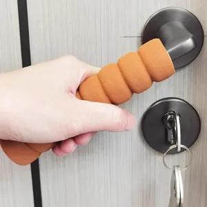 Detailed view of the colorful soft foam door handle protective cover for child safety.