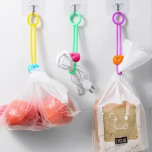 Bunte Silikon-Verschlussbänder Detail und Kabelorganizer für die Küche und Lebensmittel.