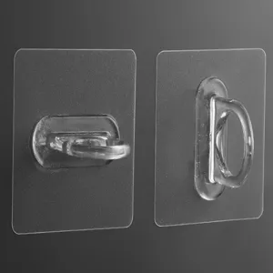 Transparente selbstklebende Wandhaken mit Schlaufendesign, lochfreie Halterungsdetails.