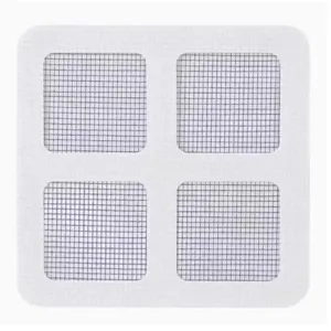 Close-up detail shot of the disposable white self-adhesive grid floor drain mesh sticker.