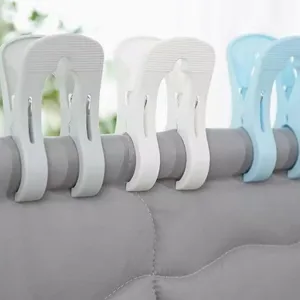 Pinces à couette en plastique durables pour linge, pinces à linge robustes pour couvertures.