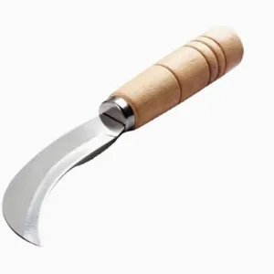 Stainless steel curved blade fruit knife with wooden handle for peeling pineapple safely.
