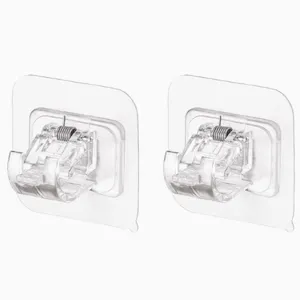 Transparente selbstklebende Gardinenstangenhalter ohne Bohren für Vorhangstangen.