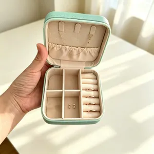 Portable travel jewelry box organizer mint green storage case for rings and necklaces