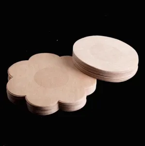 Disposable breathable non-woven pasties detail, skin tone round and floral shape.
