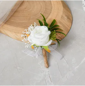 Elegant white rose boutonniere with burlap stem and ribbon for wedding prom party groom.