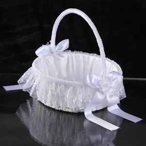 White wedding flower basket with lace and bows, perfect for flower girls at wedding ceremonies and party decor.