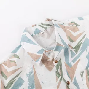 Men's Hawaiian casual short-sleeve shirt collar detail view, abstract print fabric design.