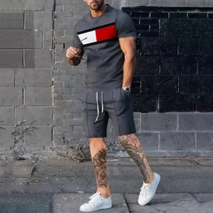 Close-up of men's grey casual shorts set, featuring striking chest color block detail.