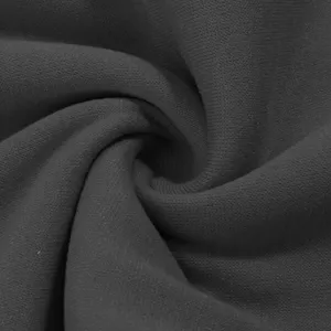 Dark grey fleece fabric detail close-up, showing soft brushed texture and thick material weave.
