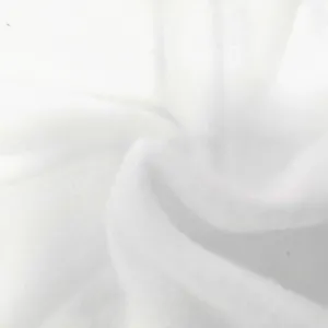 Close-up fabric detail of thick thermal brushed fleece material in pure white color.