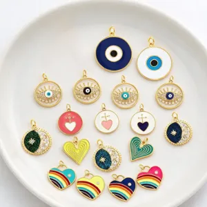 Colgantes de dijes de mal de ojo de corazón chapados en oro para accesorios de joyería DIY.