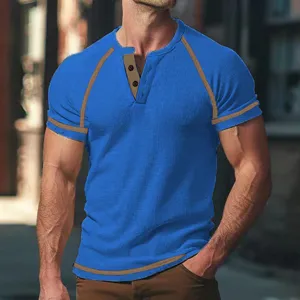 Detail view of men's blue waffle knit henley shirt with contrast trim short sleeve top.