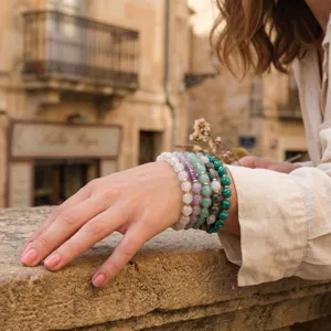 Charming multi-color faceted gemstone beaded stackable bracelet lifestyle detail view.