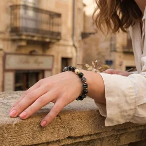 Faceted black beaded bracelet detail view, vintage layered fashion accessory for women daily wear.