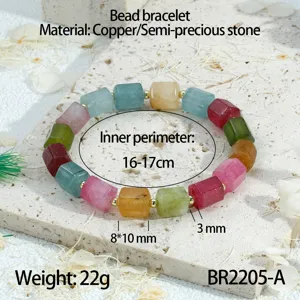 Kleurrijke toermalijn halfedelsteen kraal armband met koperen afstandshouder details voor dames.